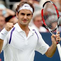 Federer breaks record with Tipsarevic win