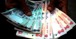 Rupee gains by another 37 paise vs US dollar